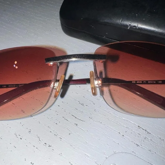 Dolce & Gabbana Women's Sunglasses - Brown/Orange in orange|brown|red from Depop, photo 1 of 1