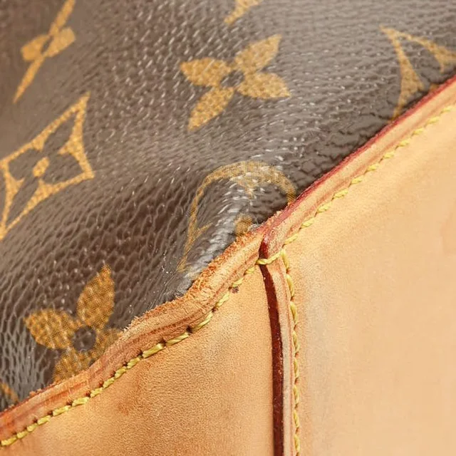 Louis Vuitton Monogram Keepall Bandoulière 60 Weekend Bag in Coated canvas from A Retro Tale, photo 8 of 12