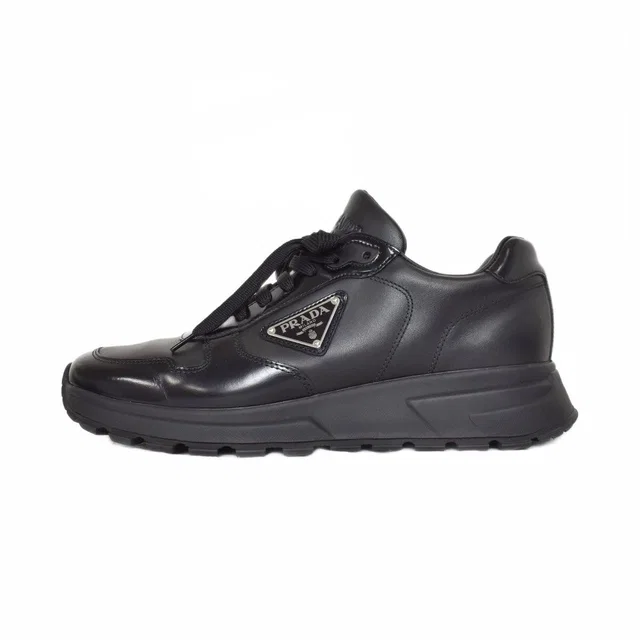 Prada Prax Sneakers Low-Cut Black 7 in Black from The Reluxe