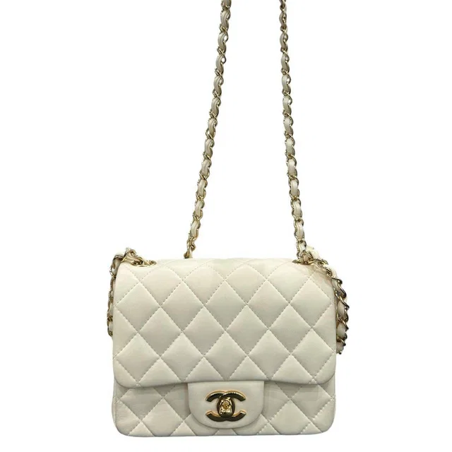 Chanel Quilted White Lambskin Shoulder Bag in White Lambskin from The Reluxe
