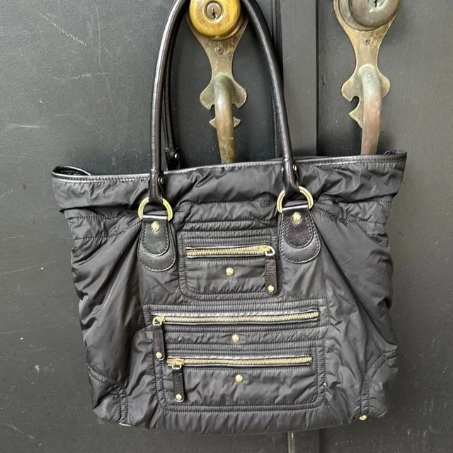 Tod's Nylon & Leather Multi Zipper Pocket Gold Hardware Shoulder Bag. in black Nylon from Poshmark