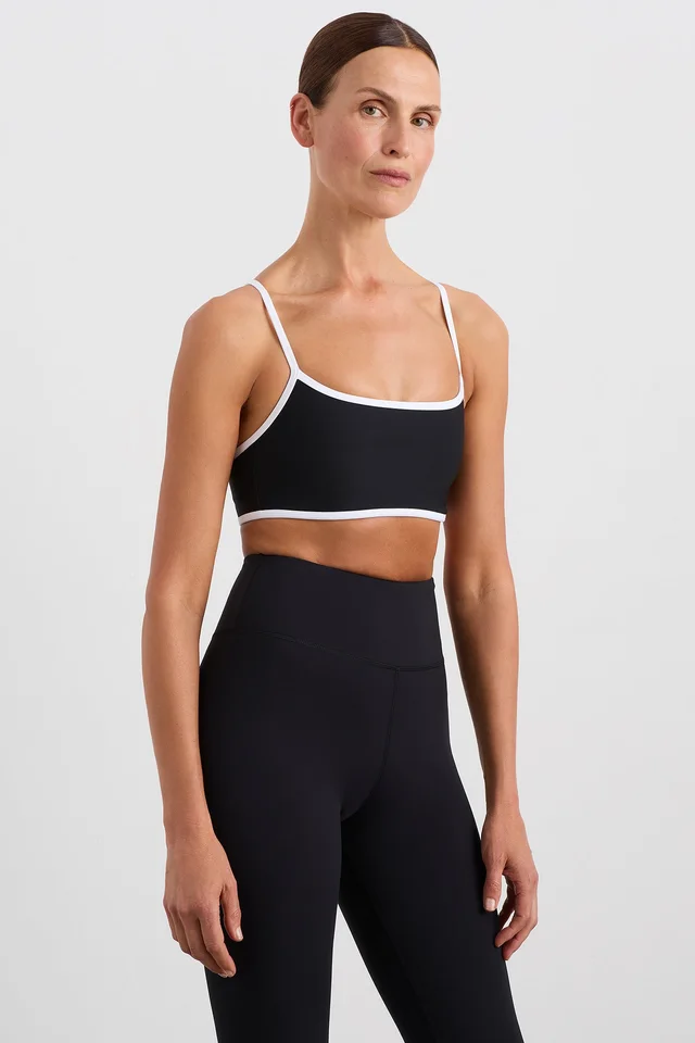 Athletica Contrast Bind Sports Bra 307 in Black from Aje, photo 1 of 1