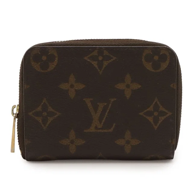 Louis Vuitton Monogram Zippy Coin Purse Zip Around Case in Coated canvas from The Reluxe
