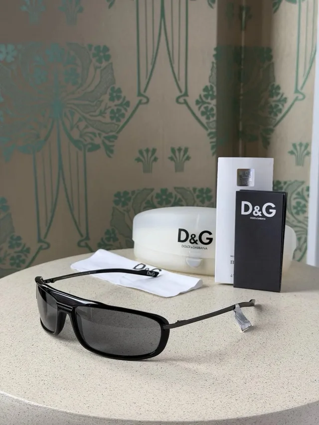 Vintage New Dg Dolce And Gabbana Black Melat Sunglasses in black from Grailed
