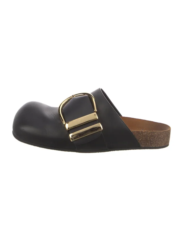 Khaite Leather Mules in black Leather from The RealReal