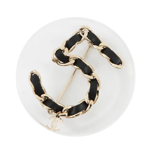 CHANEL NO.5 Brooch Black Leather Gold Plated in Black Leather from GALLERY RARE