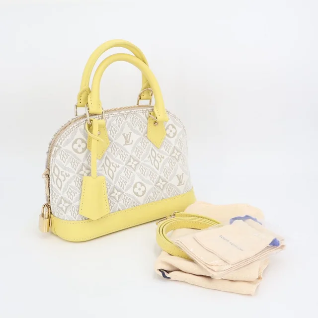 Louis Vuitton Shoulder Bag Since Alma BB Canvas Leather Light Gray Yellow in Grey Canvas from The Reluxe