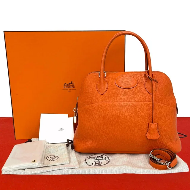 Hermès Bolide 31 Taurillon Clemence Leather 2-Way Shoulder Bag Orange in Orange Clemence leather from The Reluxe