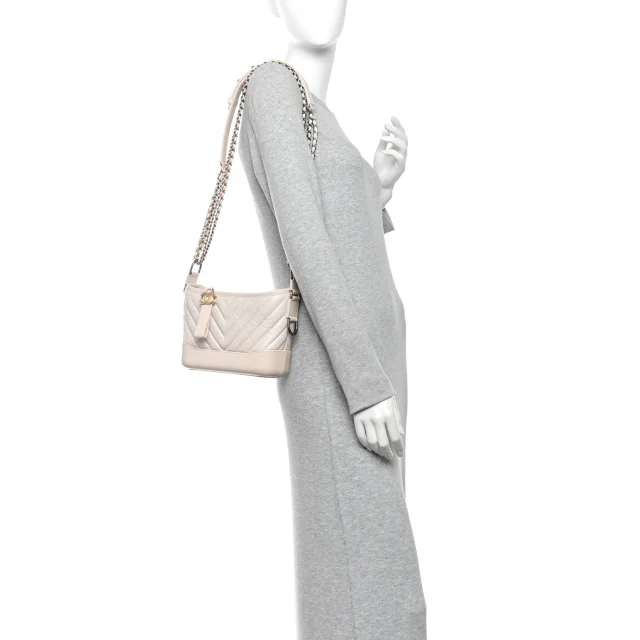 Chanel Aged Calfskin Chevron Quilted Small Gabrielle Hobo Ivory in White Calfskin from FASHIONPHILE, photo 2 of 12