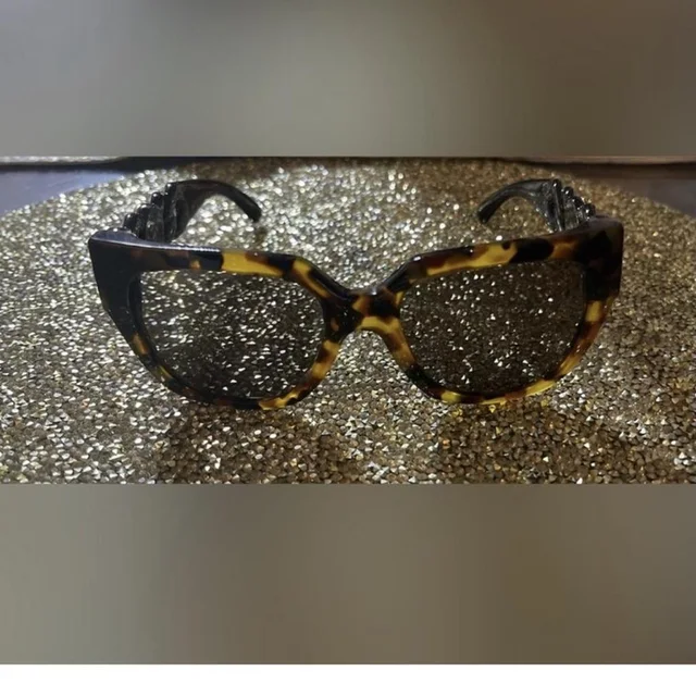 Versace Women's Sunglasses - Brown/Black in black|red|brown from Depop, photo 1 of 1