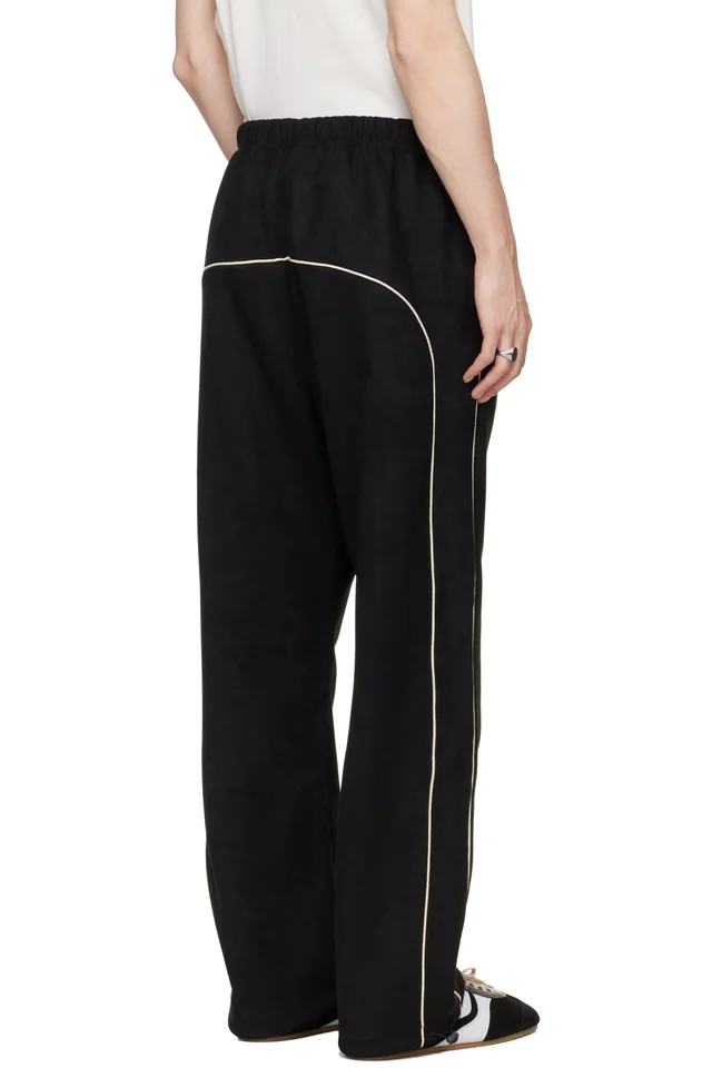 Fear of God ESSENTIALS Black Signature Relaxed Track Pants, photo 3 of 4 from SSENSE