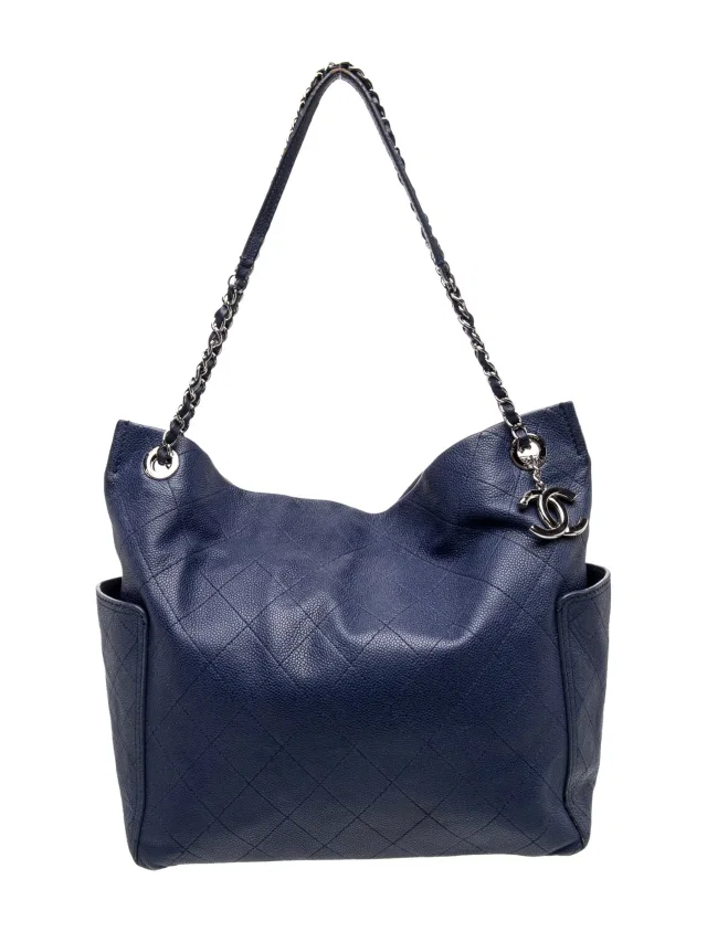 Chanel Quilted Around Pocket Hobo in blue Caviar leather from The RealReal