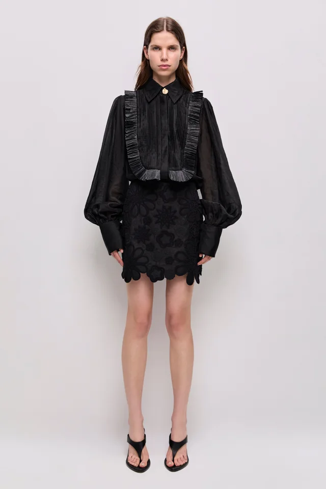 AJE Gia Embroidered Mini Skirt in Black from Aje, photo 1 of 1