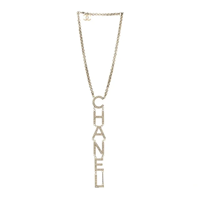 Chanel Metal Crystal Cha-Nel Logo Necklace Gold in Gold from FASHIONPHILE, photo 3 of 4
