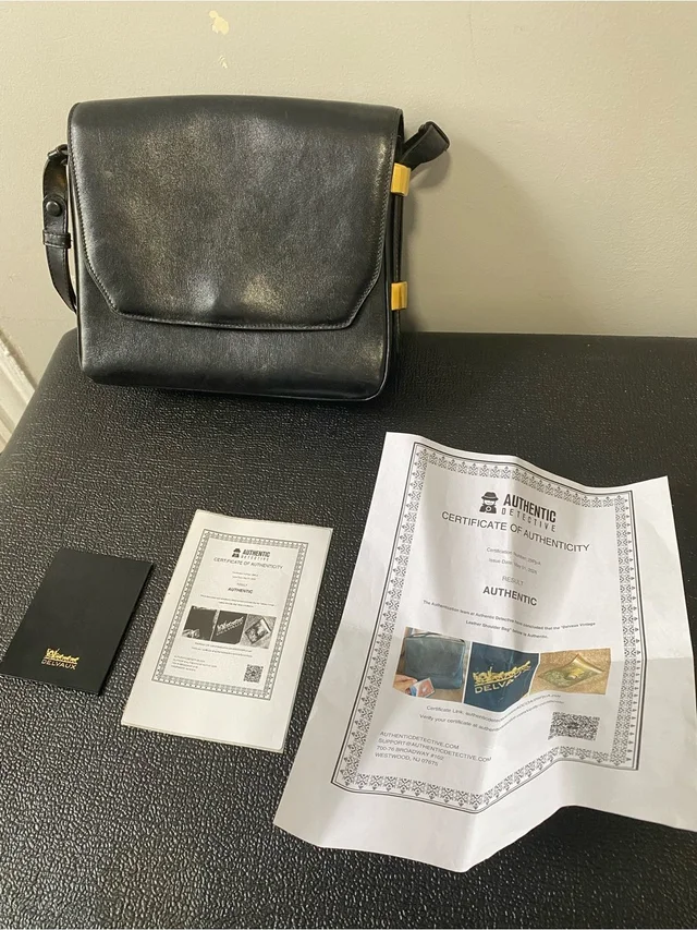 Vtg Delvaux Black Flap Snap Closure Adjustable Strap Shoulder To Cross Body Bag in black|gold Suede from Poshmark, photo 1 of 1
