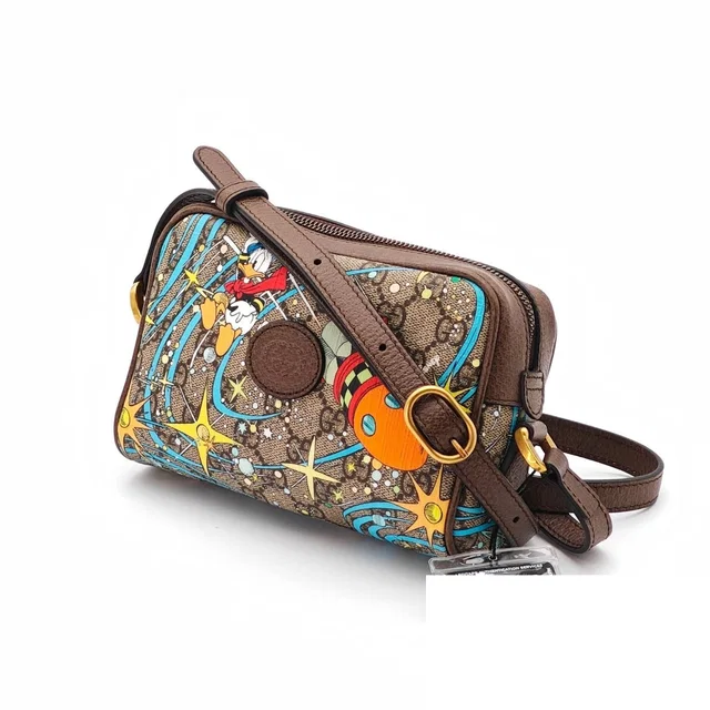 Gucci Donald Duck Shoulder Bag Colorful Beige Disney in Beige Canvas from The Reluxe