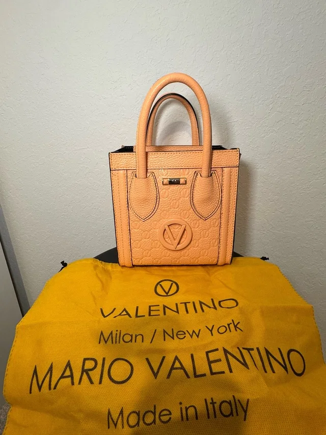 Valentino Garavani Mini Peach Embossed Leather Handbag in orange Leather from Poshmark