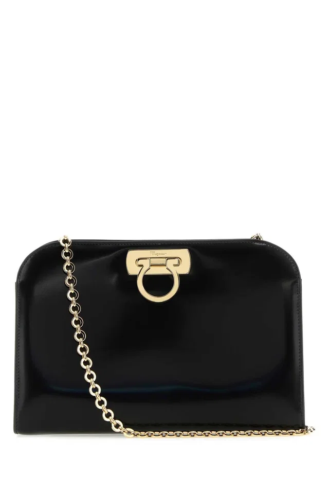 Ferragamo Gold-Plated Gancio Clasp Clutch — Black in Black Calfskin from HEWI