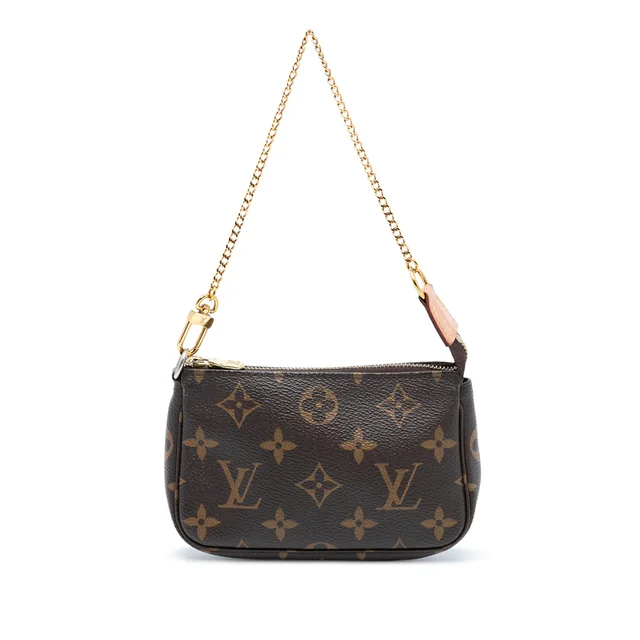Brown Louis Vuitton Monogram Mini Pochette Accessoires Handbag in Brown Coated canvas from Designer Revival, photo 1 of 1
