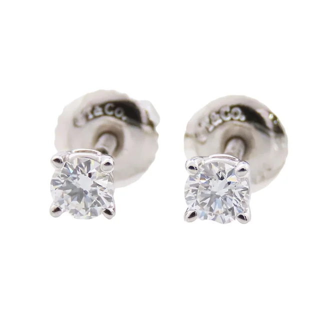 Tiffany & Co. Solitaire Platinum Diamond Earrings from The Reluxe