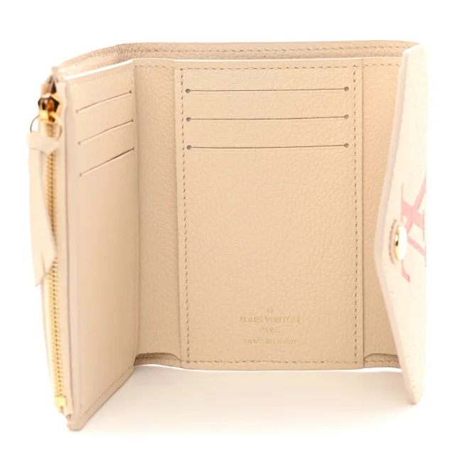 Louis Vuitton Empreinte Monogram Giant Victorine Wallet Creme Bois De Rose in Pink Calfskin from FASHIONPHILE, photo 5 of 8