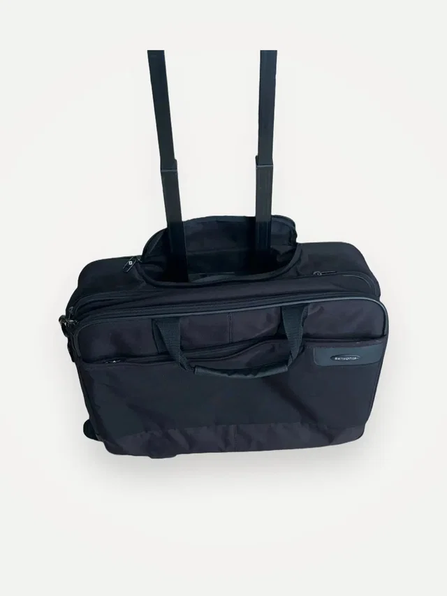 Samsonite Suitcase in Black in black from Grailed