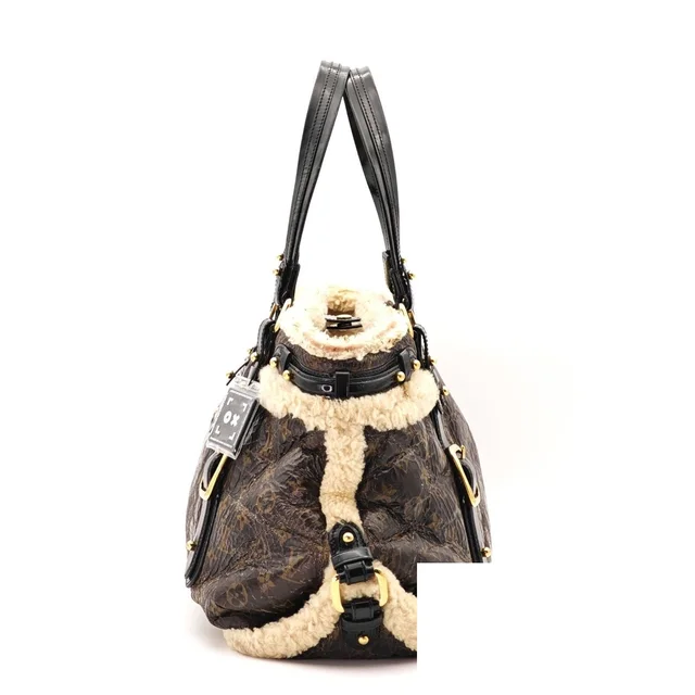 Louis Vuitton Shearling Storm Bag Handbag Brown in Brown Leather from The Reluxe, photo 2 of 2