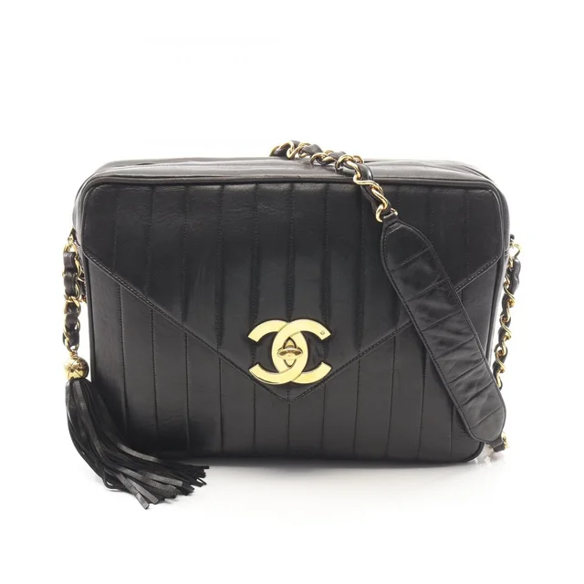 Chanel Shoulder Bag Mademoiselle Tassel Black Lambskin Fringe Chain in Black Lambskin from The Reluxe