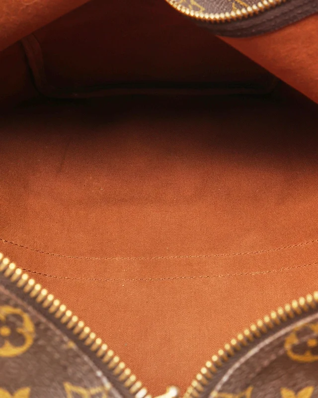 Louis Vuitton Monogram Keepall 45 Weekend Bag in Coated canvas from A Retro Tale, photo 10 of 12