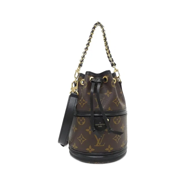 Louis Vuitton Monogram Kanoe Shoulder Bag in Coated canvas from The Reluxe