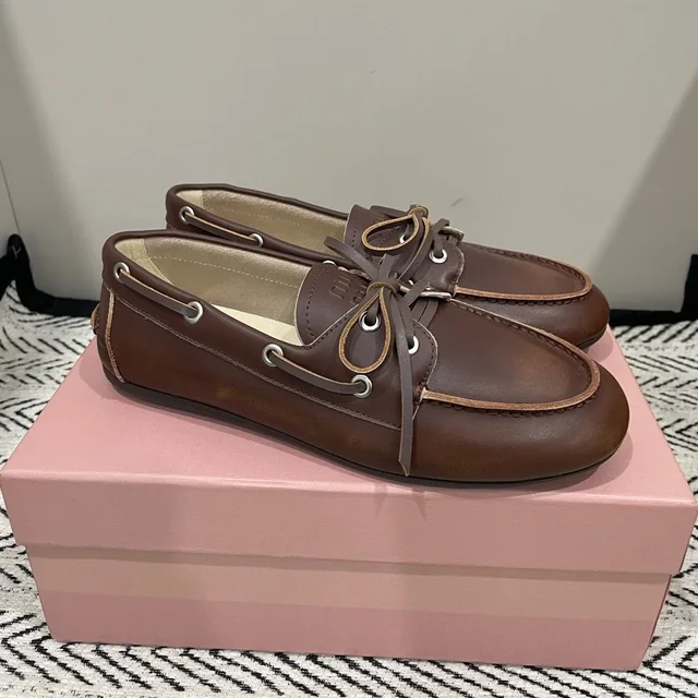 Miu Miu Women's Ballet Flats in brown|red from Poshmark