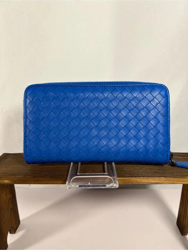 1186: Bottega Veneta Intrecciato Zip Around Wallet Blue Leather Italy in blue Woven leather from Poshmark