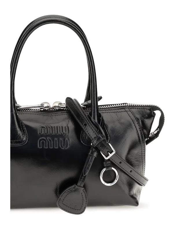 Miu Miu Structured Calf Leather Top Handle Bag — Black in Black Calfskin from HEWI