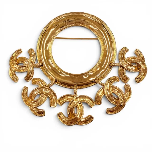 Chanel Vintage 94P CC Logo Circle Swing Brooch Gold French in Gold from The Reluxe
