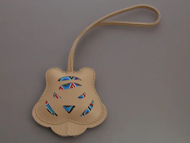 Hermès Tiger Petit H Bag Charm in Lambskin from Ann's Fabulous Finds, photo 2 of 5