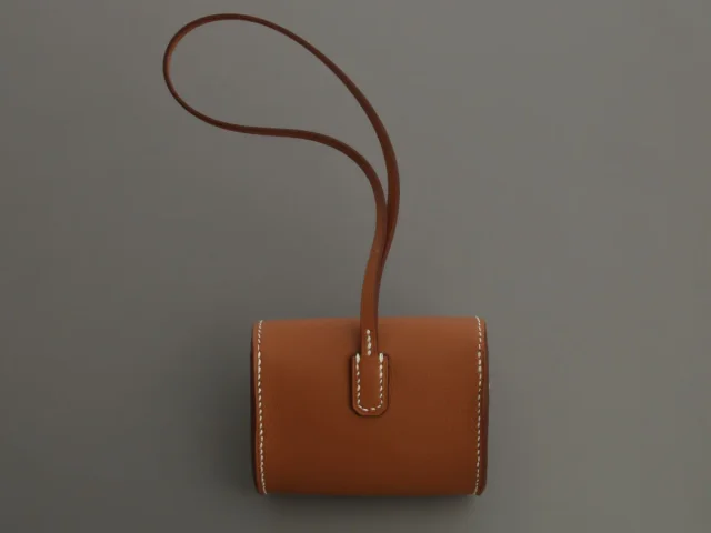 Hermès Gold Swift Kelly Festival Bag Charm in Gold Swift leather from Ann's Fabulous Finds, photo 3 of 6