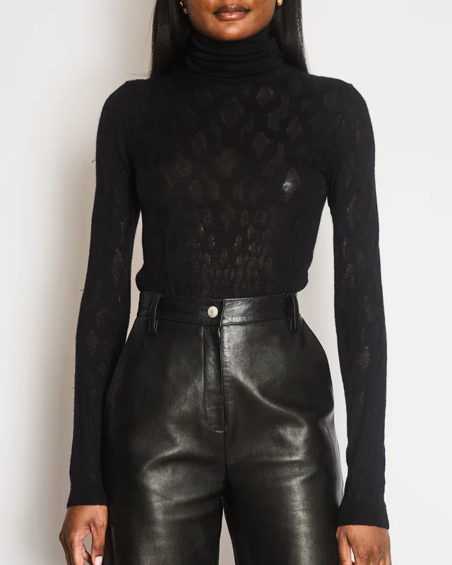 Chanel Black Knit High-Neck Top with Silver CC Logo Button Detail Size FR 34 (UK 6) in Black Wool from Sellier, photo 2 of 2