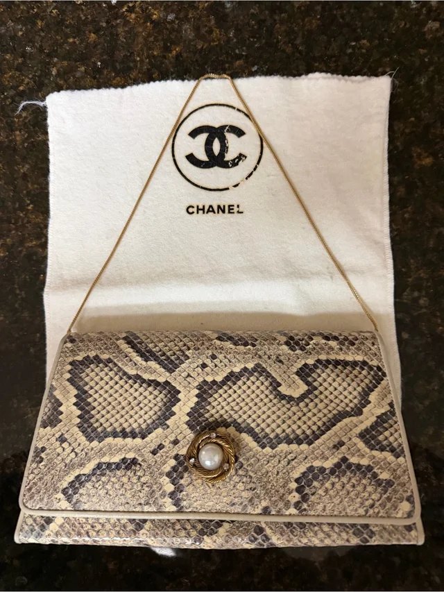 Chanel Beige And Black Python Shoulder Bag With Pearl Cc Button in gold Python from Poshmark, photo 1 of 1