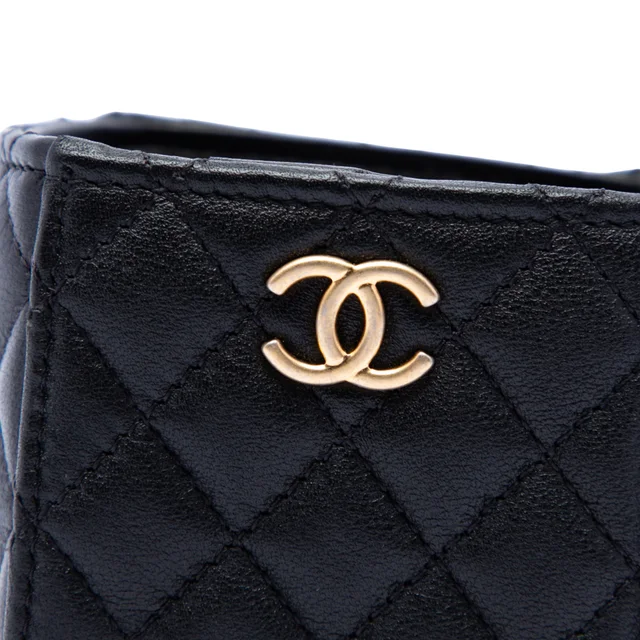 Black Chanel Mini Quilted Calfskin Drawstring Bucket Bag in Black Calfskin from Designer Revival, photo 2 of 2