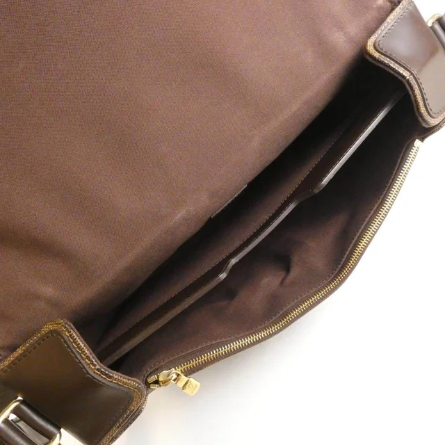 Louis Vuitton Damier Spencer Coated Canvas Shoulder Bag in Bronze Canvas from LuxUness, photo 9 of 10