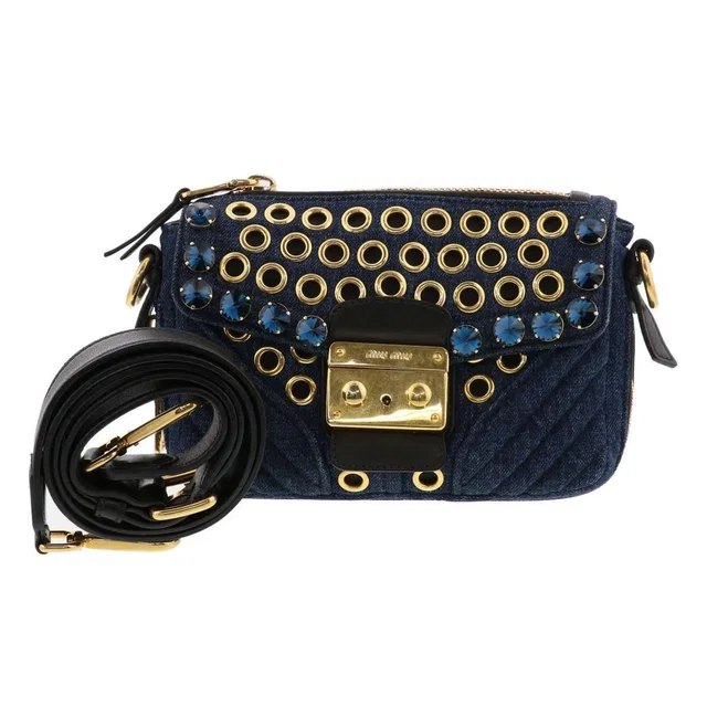 Miu Miu Biker Shoulder Bag Denim Leather Blue Black Perforated Clutch in blue|black Denim from Poshmark
