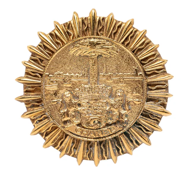 Gold Chanel Gold Plated Coat Of Arms Medallion Sunburst Brooch in Gold from Designer Revival