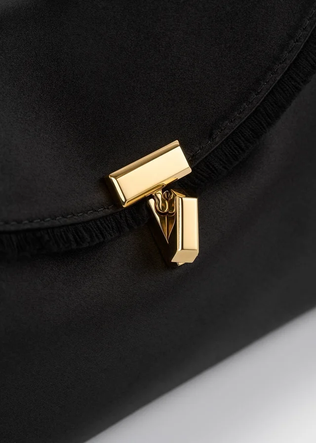 Toteme Mini T-lock frayed satin clutch black, photo 5 of 6 from SENSER