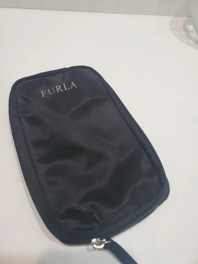Furla X Turkish Airlines Cosmetic Pouch in black from Poshmark