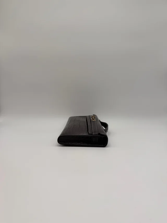 Hermès Kelly Cut Graphite Matt Porosus Permabrass Hardware in Grey Leather from Luxury Promise, photo 5 of 11