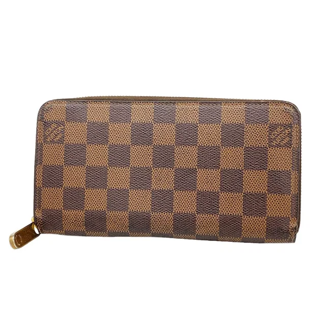 Louis Vuitton Wallet Damier Zippy Ebene in Brown from The Reluxe