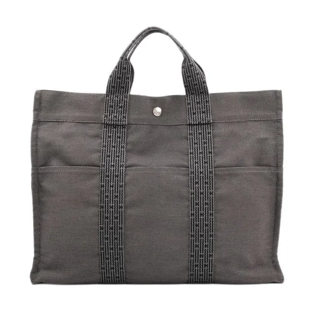 Hermès Tote Bag Herline MM in Canvas from The Reluxe