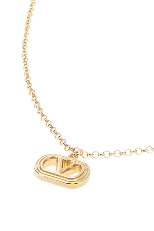 Valentino Garavani Logo-Charm Pendant Necklace — Gold Necklaces in Gold from HEWI, photo 2 of 3