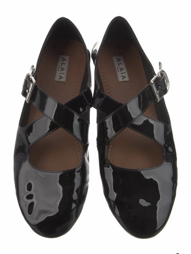 Alaïa Cross Black Patent Leather Flats Sz 40.5 in black Patent leather from Poshmark
