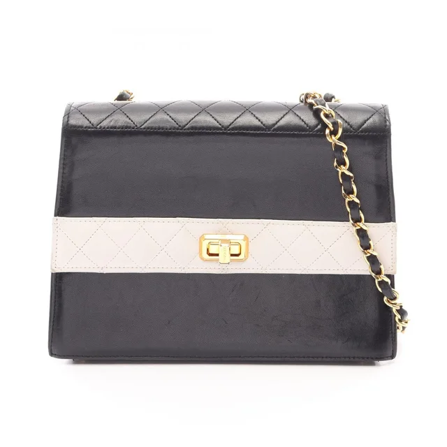 Chanel Shoulder Bag Quilted Black White Lambskin Bicolor Chain in Black Lambskin from The Reluxe
